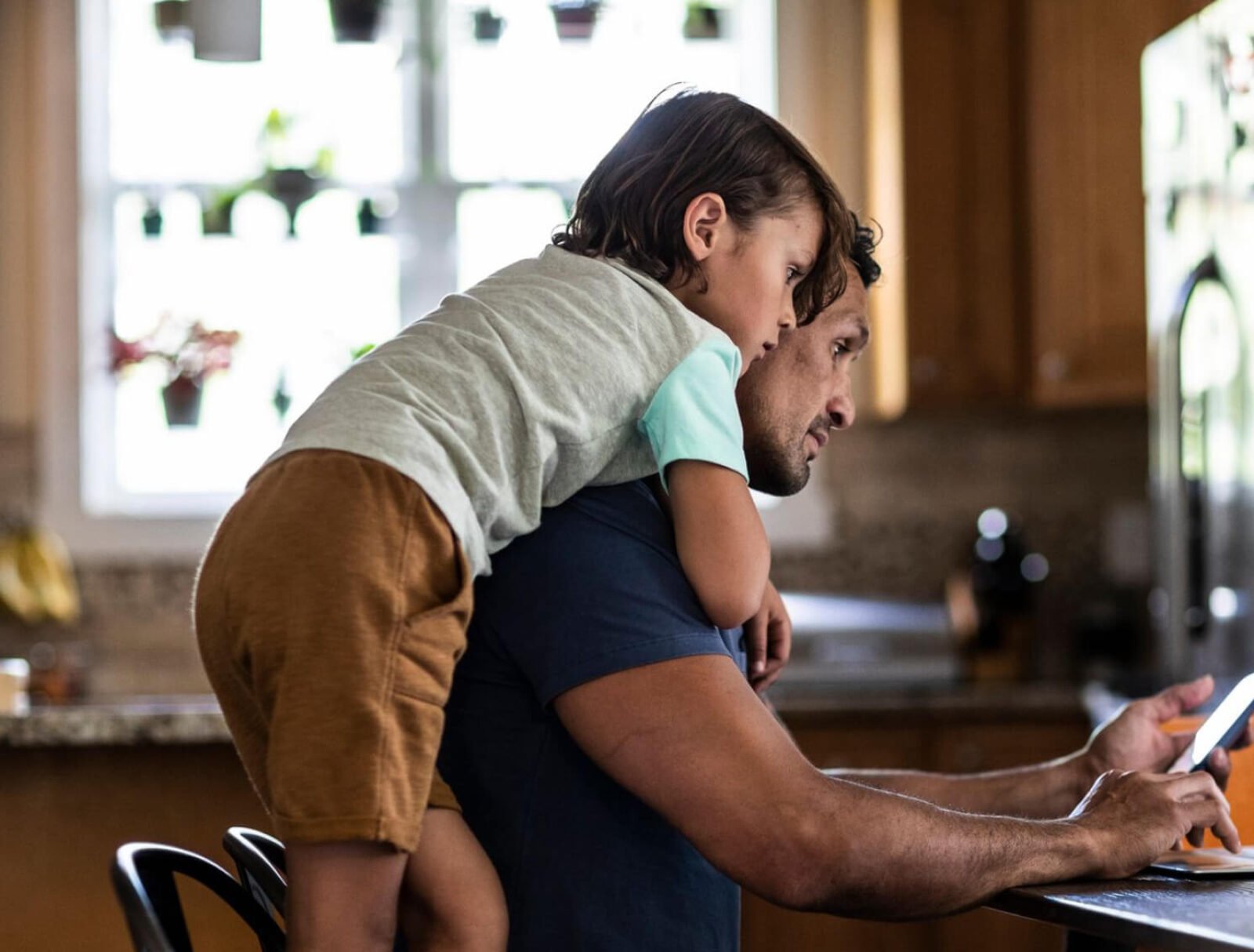 Father and son at a computer